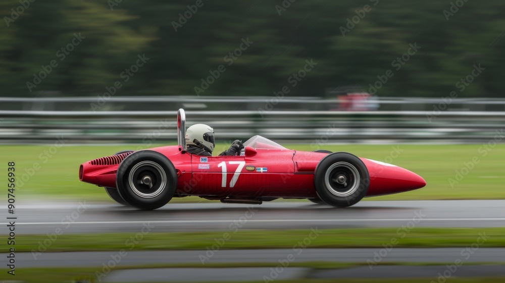 Red racing car speeds on track in daylight during race Red racing car speeds on track in daylight during race