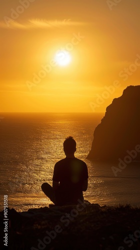 Silhouette of a man meditating at sunset with ocean views.