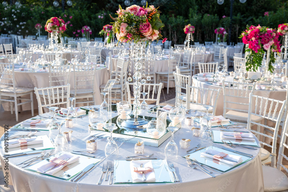 Beautifully Decorated Wedding Tables by the Swimming Pool Outdoors