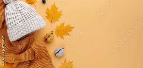 Cozy Autumn Accessories and Decorations on Yellow Background