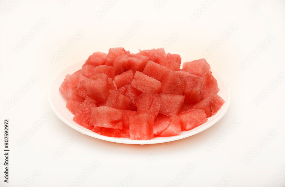 Slices of ripe watermelon on a white plate. Delicious and juicy watermelon. Slices of ripe watermelon on a white plate. Delicious and juicy watermelon.