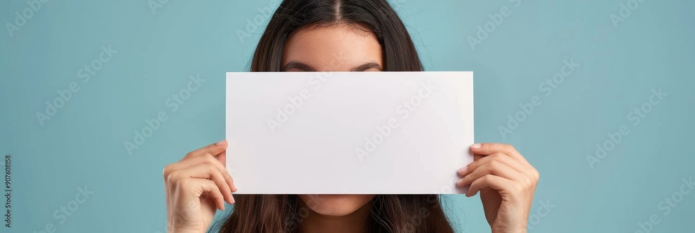 Blank diploma certificate mockup and empty photo frame held above a woman s head at close range Blank diploma certificate mockup and empty photo frame held above a woman s head at close range