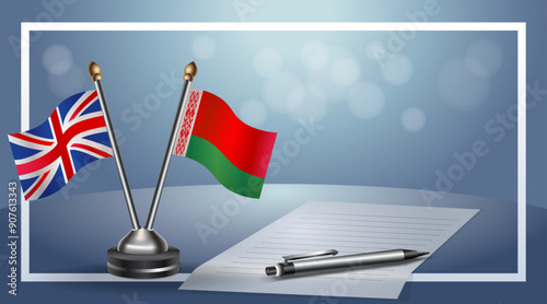 United Kingdom and Belarus Small national flag on bokeh background, cooperative relationship