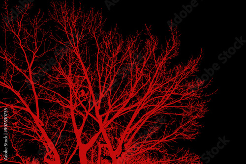Intricate Silhouette of Tree Branches Artistically Designed Against a Dark Background
