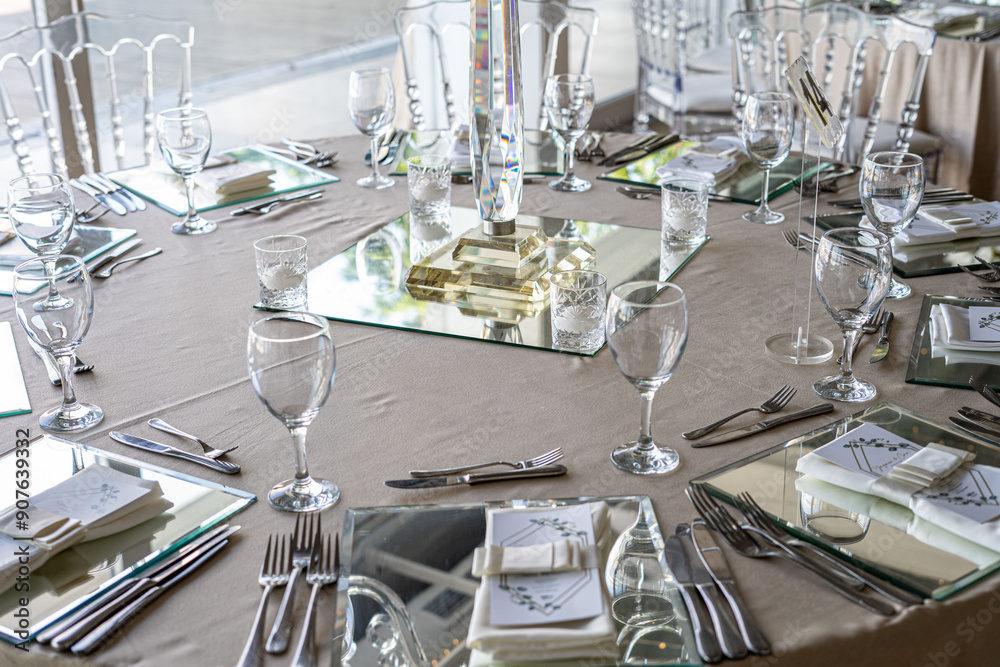Indoor Wedding Reception: Round Tables with Unique Floral Centerpieces