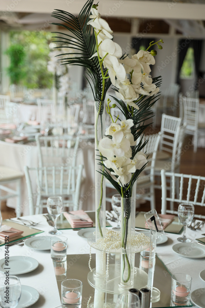 Indoor Wedding Reception: Round Tables with Unique Floral Centerpieces