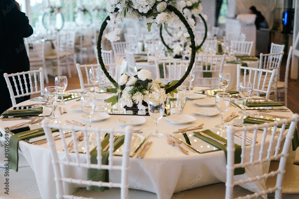Elegant Wedding Table Setting with Floral Hoops and White Flowers