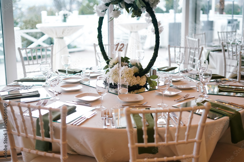 Elegant Wedding Table Setting with Floral Hoops and White Flowers