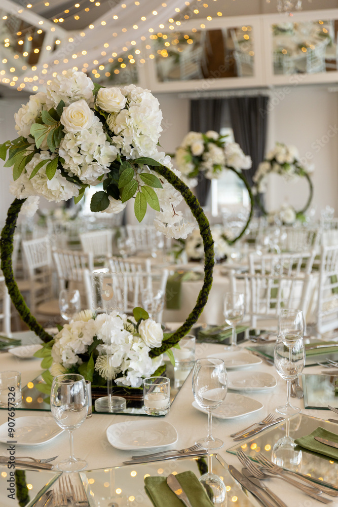 Elegant Wedding Table Setting with Floral Hoops and White Flowers