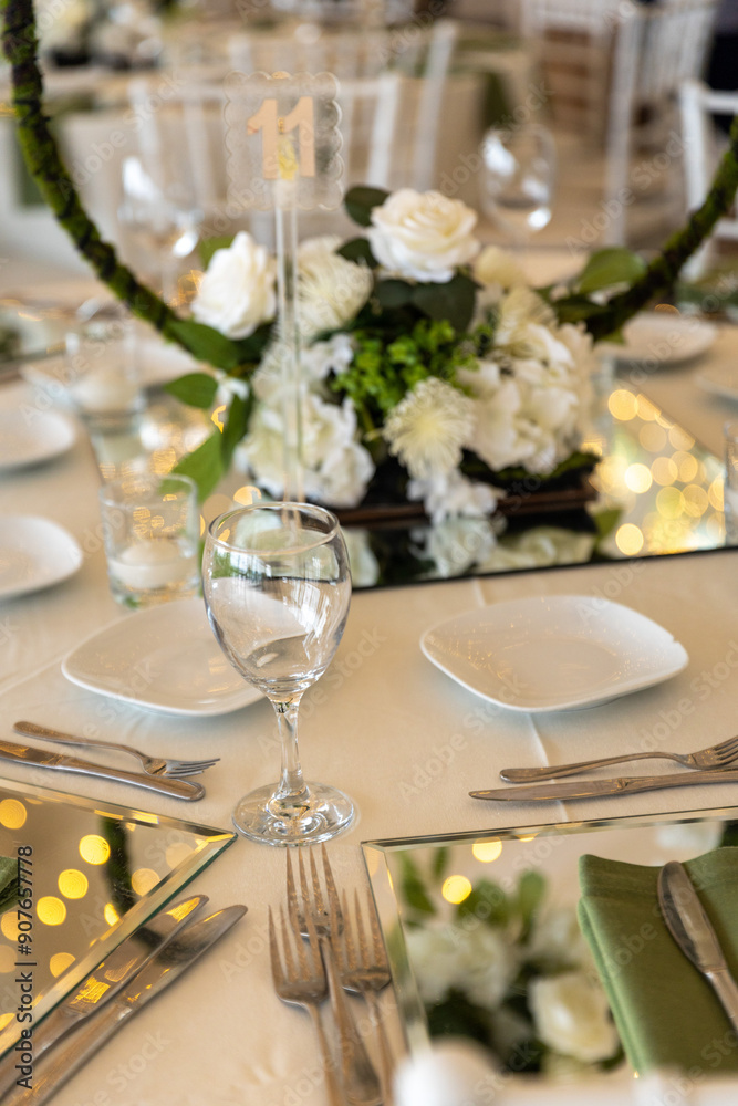 Indoor Wedding Reception: Round Tables with Unique Floral Centerpieces