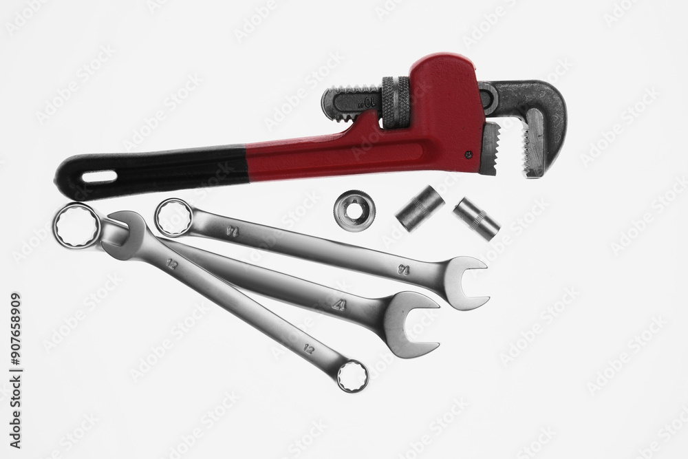 Set of auto mechanic's tools on white background, flat lay Set of auto mechanic's tools on white background, flat lay