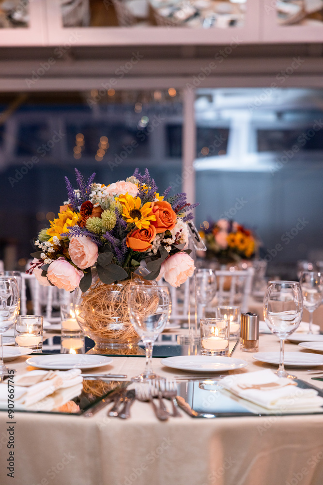 Romantic Dinner Setup: Table with Sunflower Bouquet and Cityscape at Night