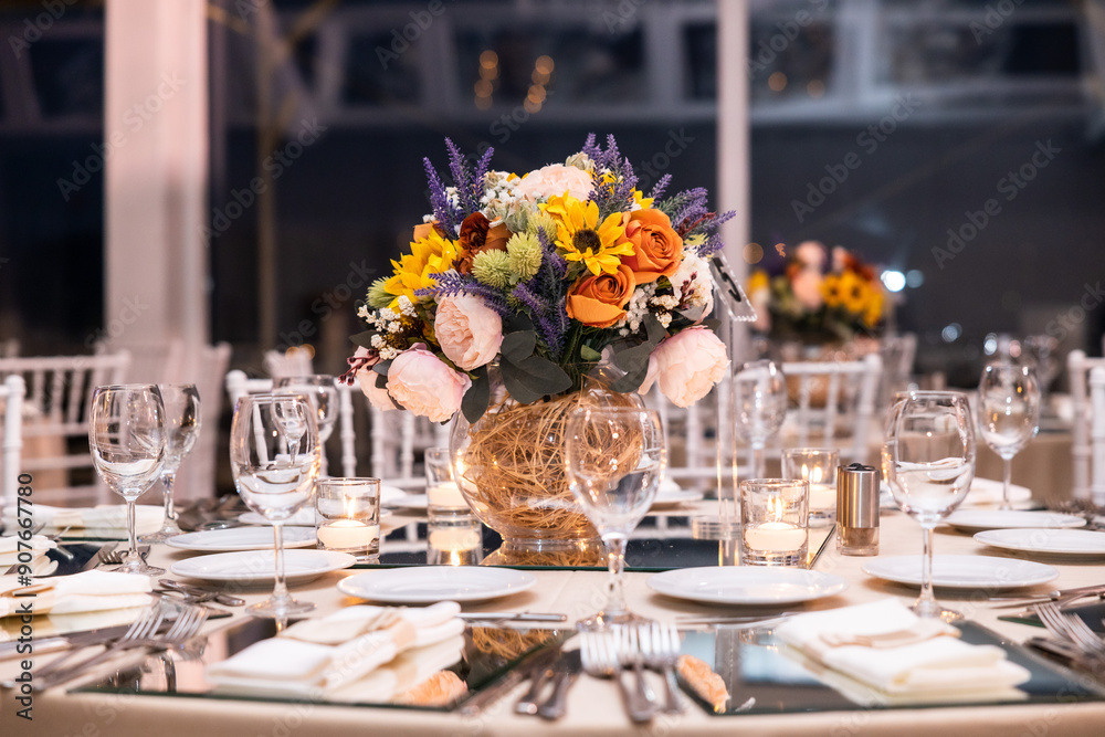 Romantic Dinner Setup: Table with Sunflower Bouquet and Cityscape at Night