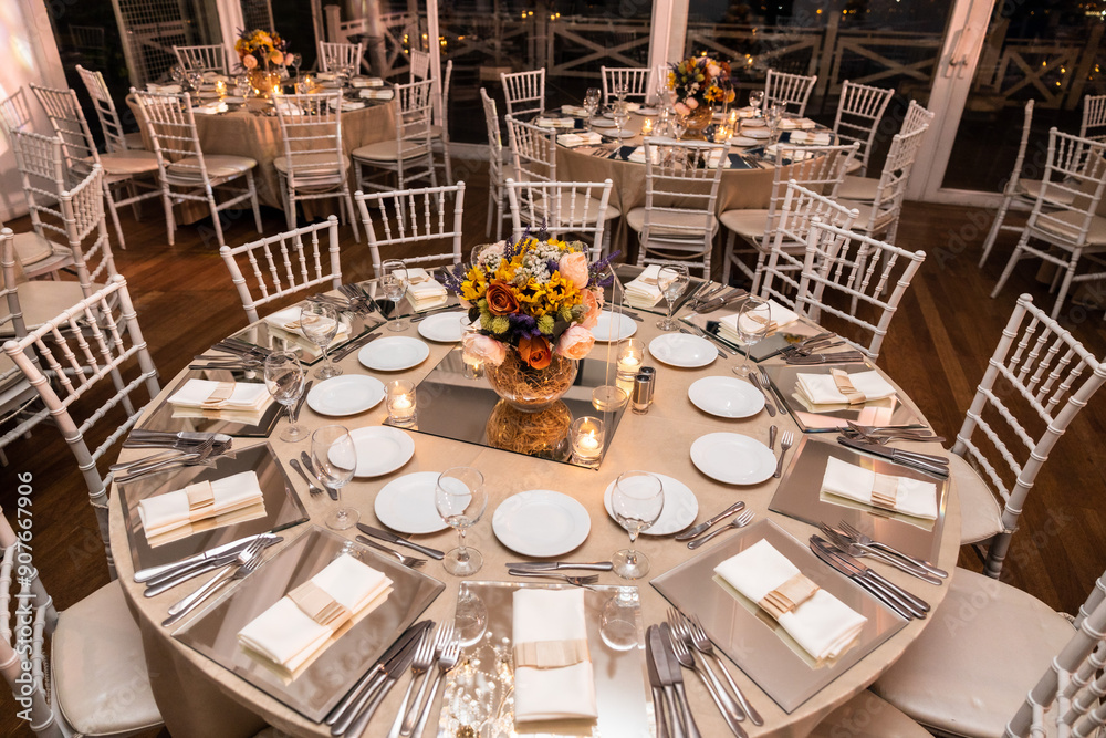 Romantic Dinner Setup: Table with Sunflower Bouquet and Cityscape at Night