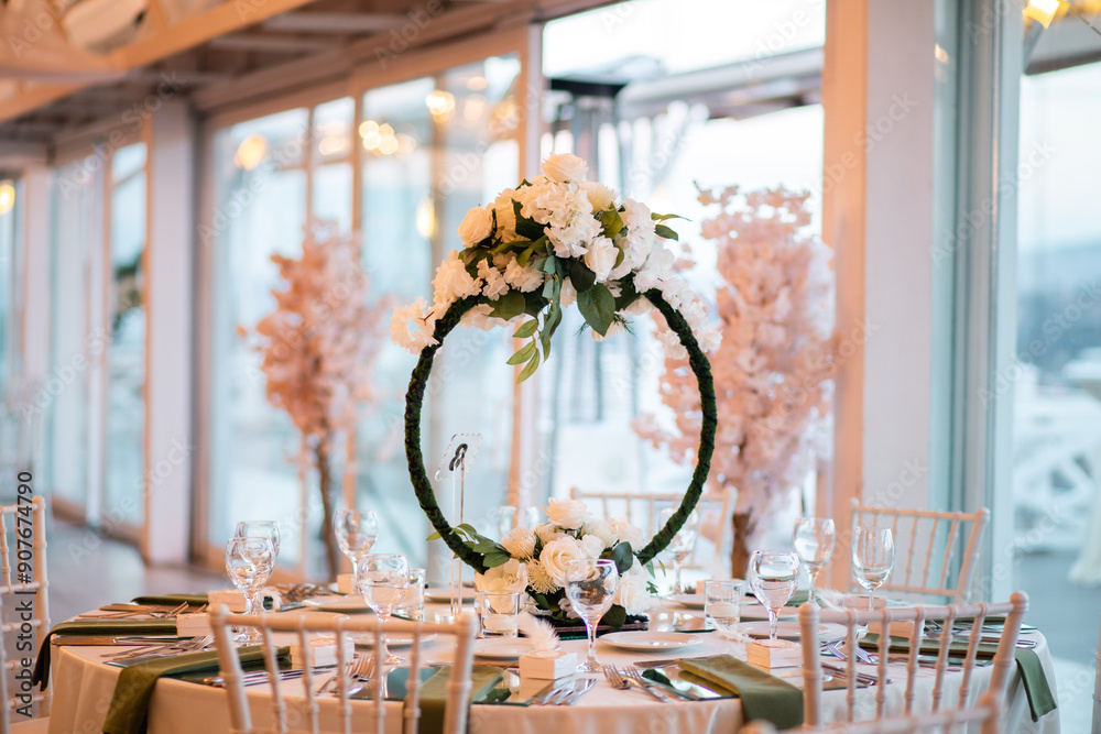 Luxurious dining arrangement near Bosphorus Bridge with white roses and modern decor