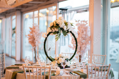 Luxurious dining arrangement near Bosphorus Bridge with white roses and modern decor

