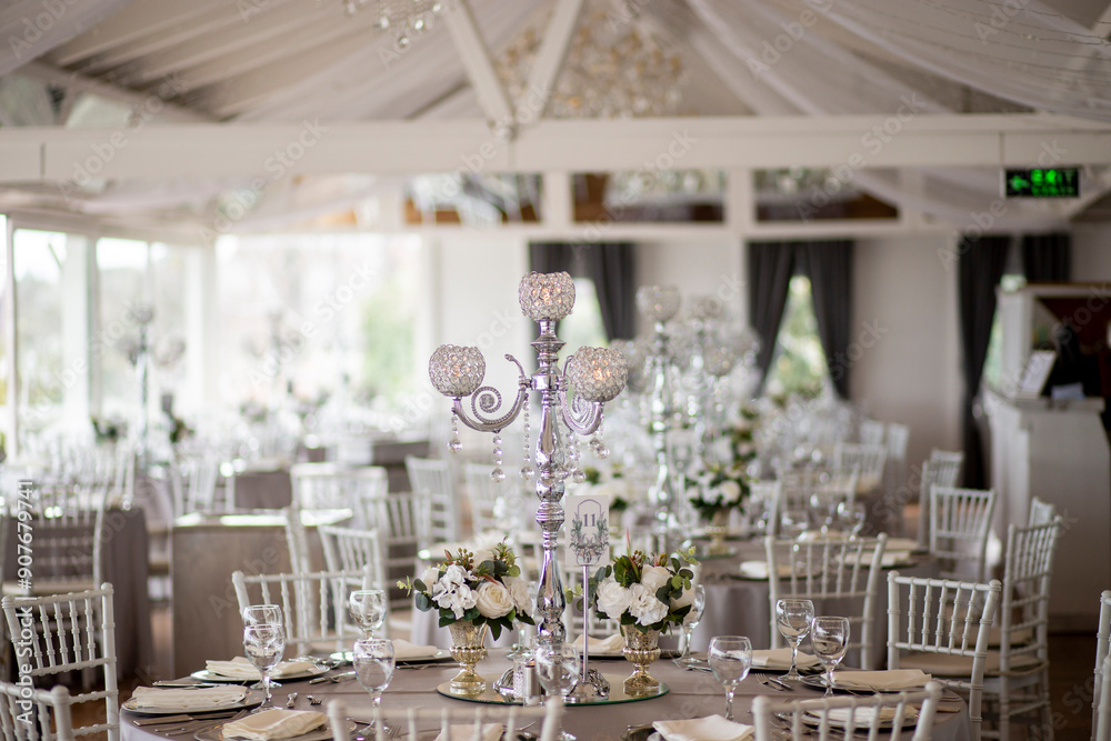 Elegant Indoor Wedding Reception with Blue Hydrangeas and White Roses Centerpiece