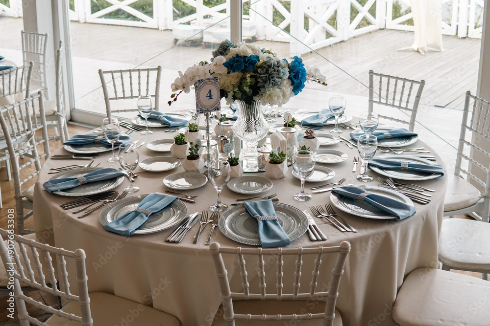 Beautiful Wedding Venue in Istanbul: Tables with Floral Centerpieces and Bridge View