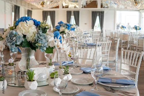Beautiful Wedding Venue in Istanbul: Tables with Floral Centerpieces and Bridge View