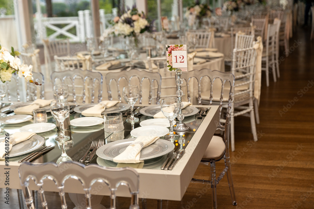 Stylish Outdoor Reception: Lounge Furniture with Floral Accents and Urban Panorama