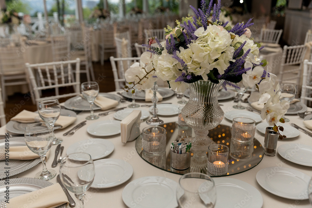 Stylish Outdoor Reception: Lounge Furniture with Floral Accents and Urban Panorama