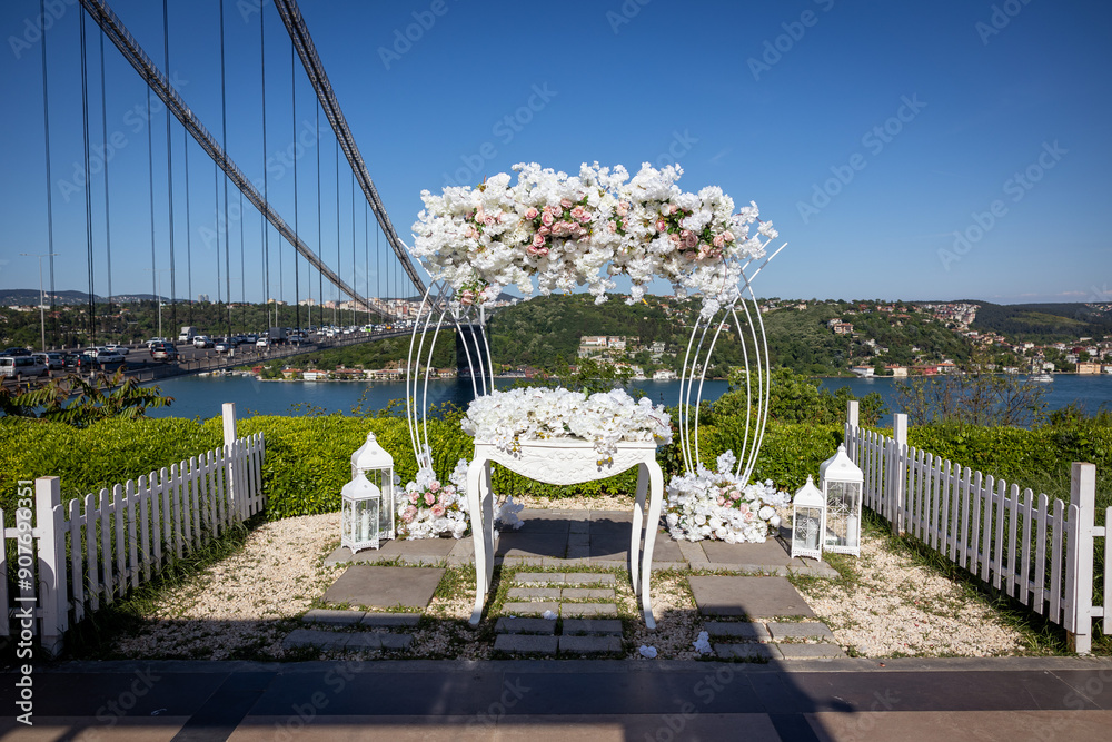 Elegant Wedding Decor with White Flowers and Bosphorus Bridge View