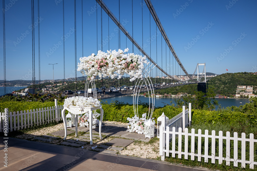 Elegant Wedding Decor with White Flowers and Bosphorus Bridge View