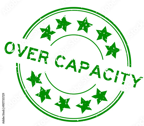 Grunge green over capacity word with star icon round rubber seal stamp on white background