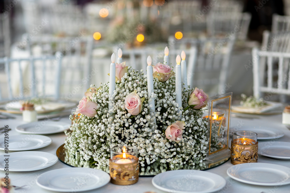 Charming Indoor Wedding Table Setting with Delicate Floral Decor and Candles