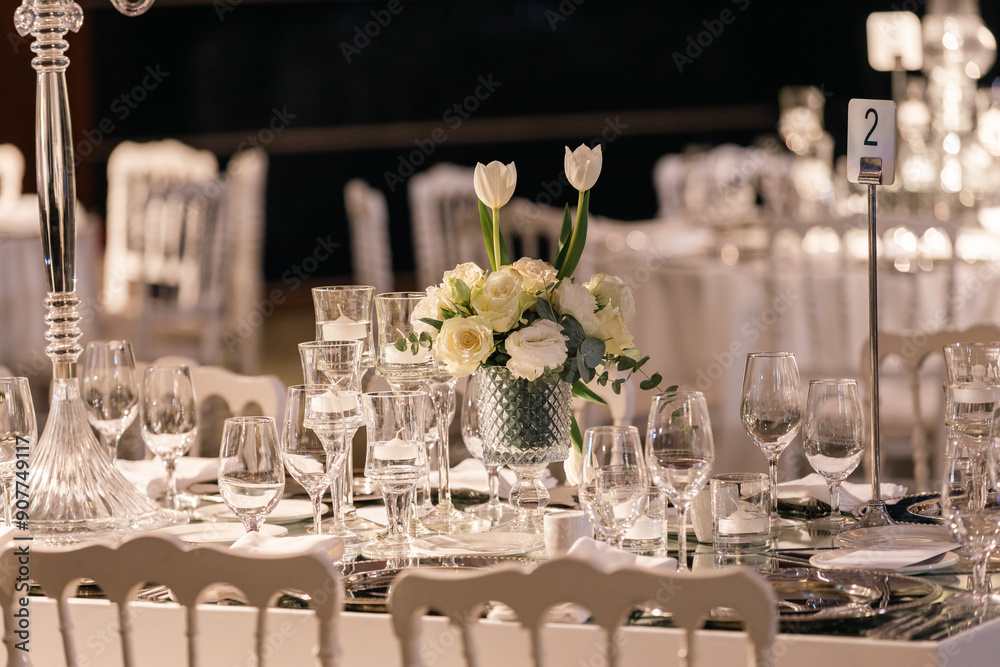 Luxury Wedding Venue: Beautifully Decorated Table with Crystal Candelabras and White Candles