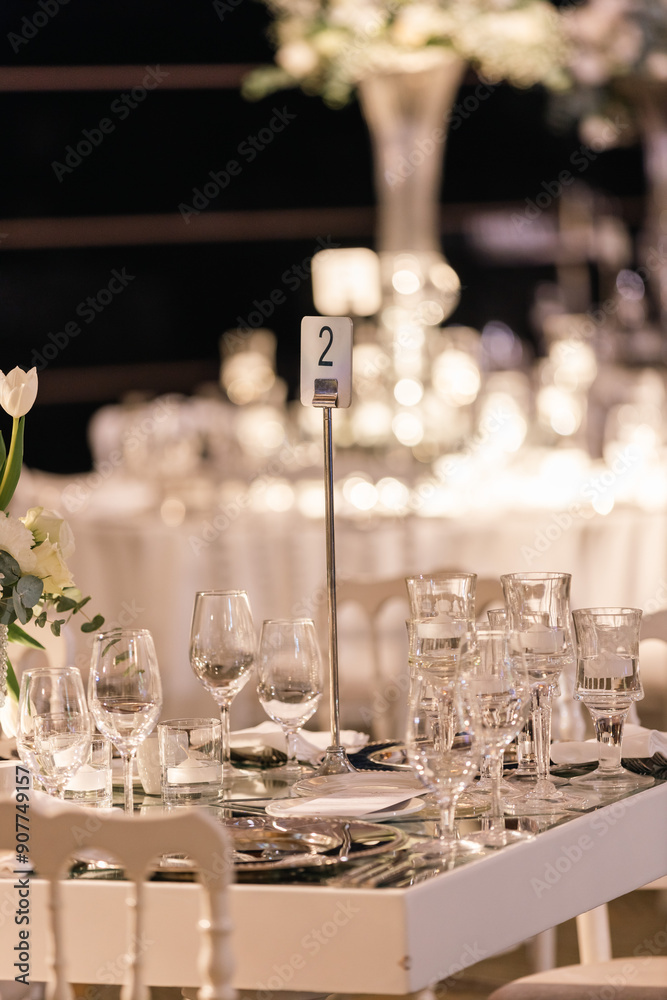 Luxury Wedding Venue: Beautifully Decorated Table with Crystal Candelabras and White Candles