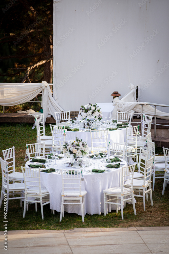 Elegant Outdoor Wedding Reception with Wisteria Floral Centerpieces
