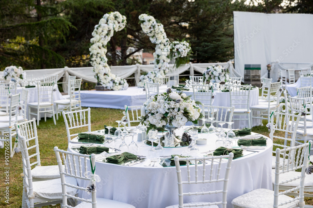 Elegant Outdoor Wedding Reception with Wisteria Floral Centerpieces