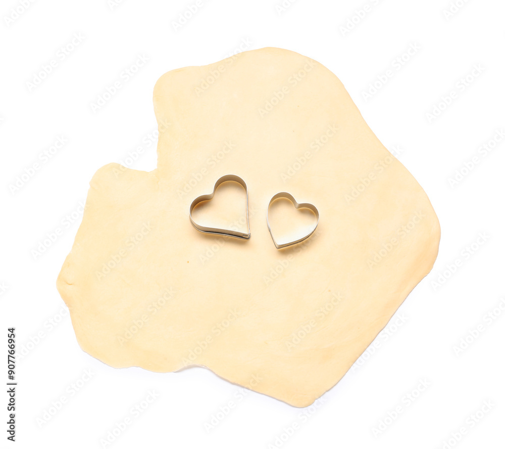 Raw dough and cookie cutters isolated on white, top view Raw dough and cookie cutters isolated on white, top view