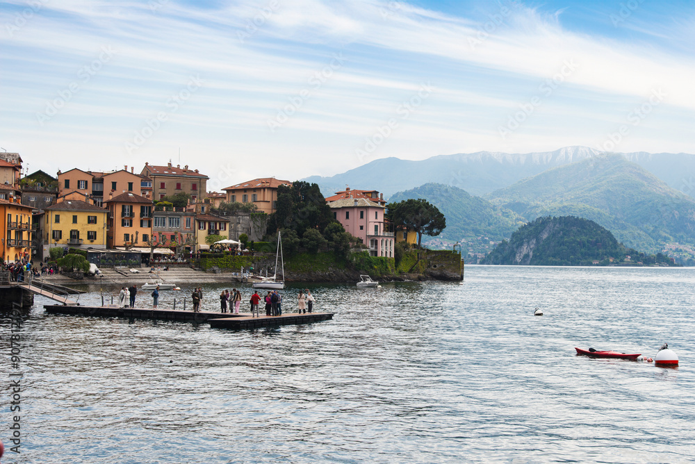 Obraz premium Lake como, Italy-April 26, 2024: People Enjoying Lakeside View in Varenna
