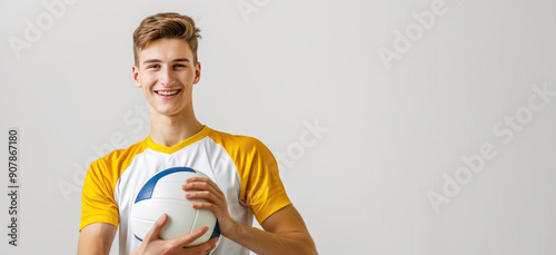 american teen hold volley ball on white background with copy space