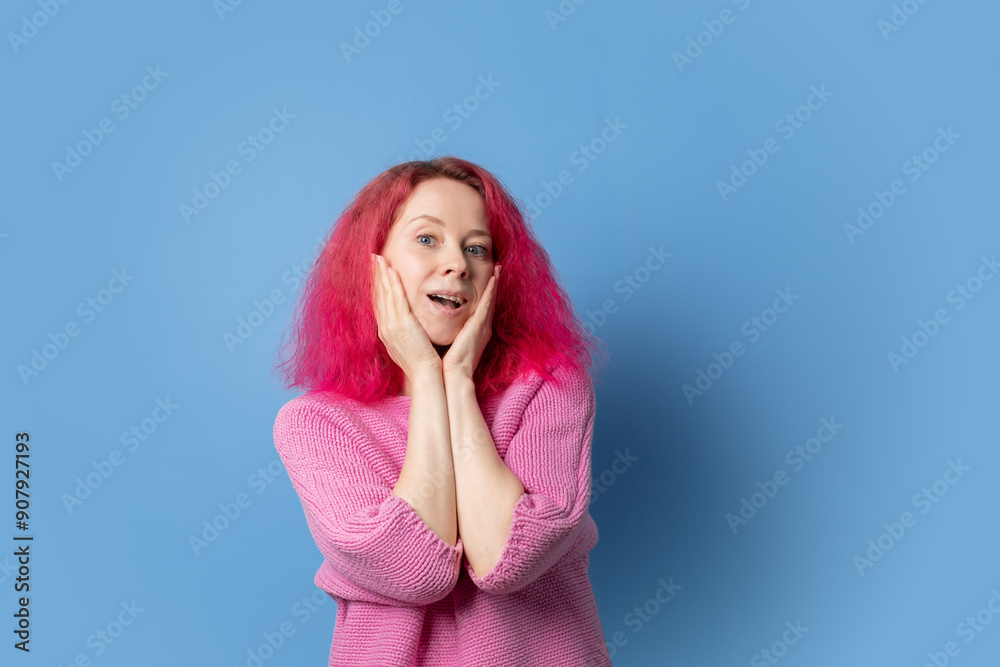 Woman with pink hair portrait, beautiful adult posing, fashionable girl fun. Woman with pink hair portrait, beautiful adult posing, fashionable girl fun.