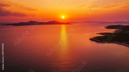 A mesmerizing sunset casts a warm, orange glow over the serene islands, showcasing the beauty of the Croatian coastline. The image symbolizes peace, tranquility, nature, beauty, and escape.