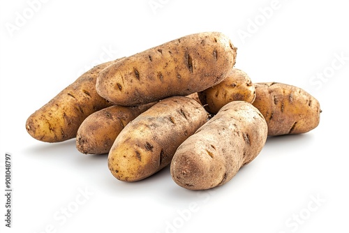 Fresh russet potatoes with earthy skin isolated on white background