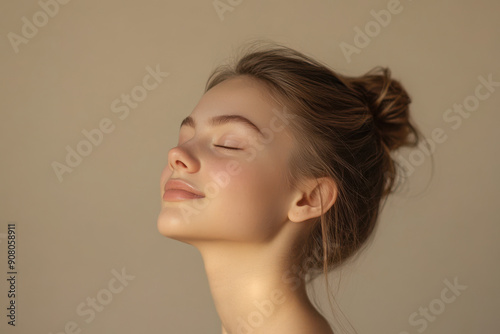 A close up of a girl's face with her eyes closed