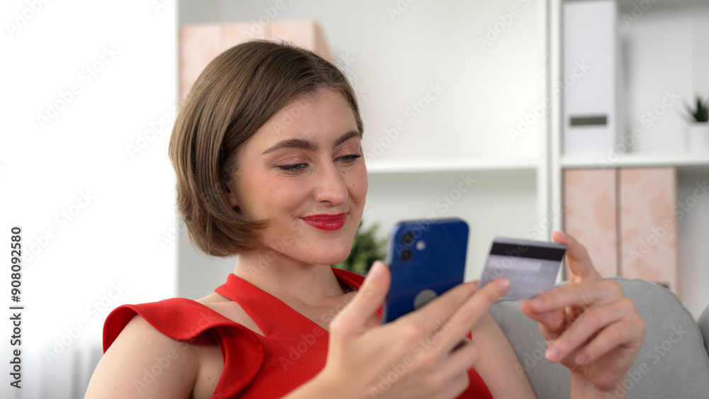 Woman shopping or pay online on internet marketplace browsing for sale items for modern lifestyle and use credit card for online payment from wallet protected by prim cyber security software Woman shopping or pay online on internet marketplace browsing for sale items for modern lifestyle and use credit card for online payment from wallet protected by prim cyber security software