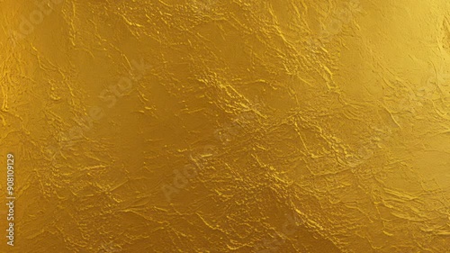 Gold wall texture background. Yellow shiny gold foil paint on wall sheet with gloss light reflection, vibrant golden paper luxury wallpaper. Shiny Gold Wall Texture