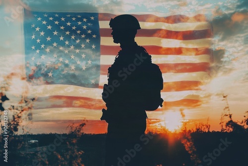 A Silhouette of a Soldier Standing Before an American Flag at Sunset