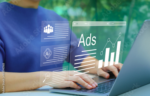 AI Analyzing Online Advertising Campaigns. Digital marketing concept. Person using laptop with virtual displays Ads and graphs, AI technology in digital marketing and online advertising analysis. AD, photo