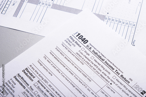 Tax form 1040 forms lying on table close-up, tax concept photo