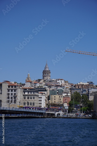 Vertical Galata Tower view taken behind buildings and Marmara Sea.Galata Tower background, view Istanbul.