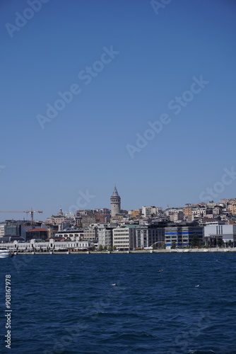 Vertical Galata Tower view taken behind buildings and Marmara Sea.Galata Tower background, view Istanbul.