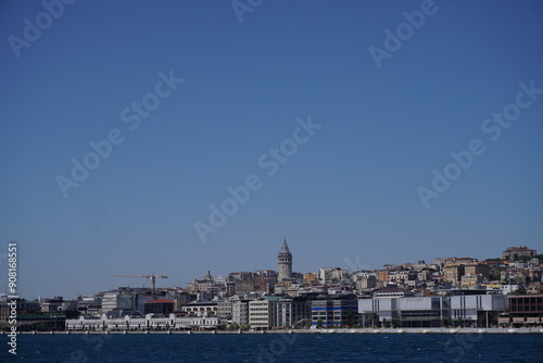 Horizontal Galata Tower view taken behind buildings and Marmara Sea.Galata Tower background, view Istanbul.