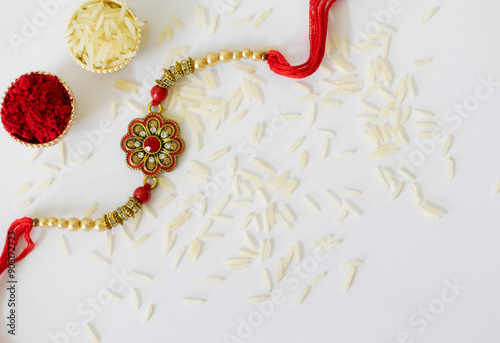 Rakshabandhan festival photos with white tabletop and rakhi roli rice photo