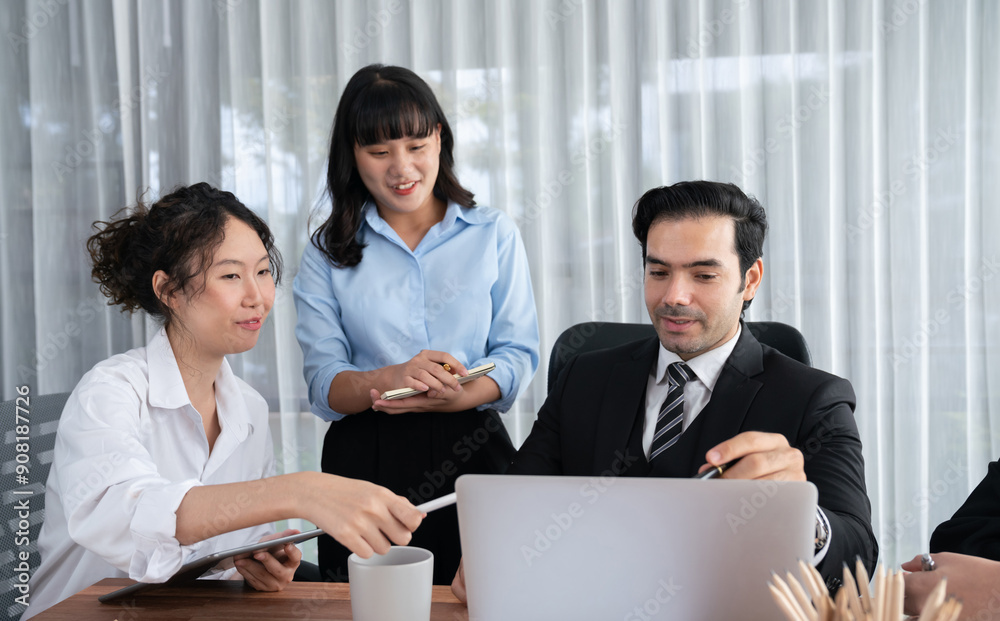 Diverse of business people from various ethnic group working in modern office environment. Productive and multi ethnic office workers engage in discussion for strategic business marketing. Habiliment Diverse of business people from various ethnic group working in modern office environment. Productive and multi ethnic office workers engage in discussion for strategic business marketing. Habiliment